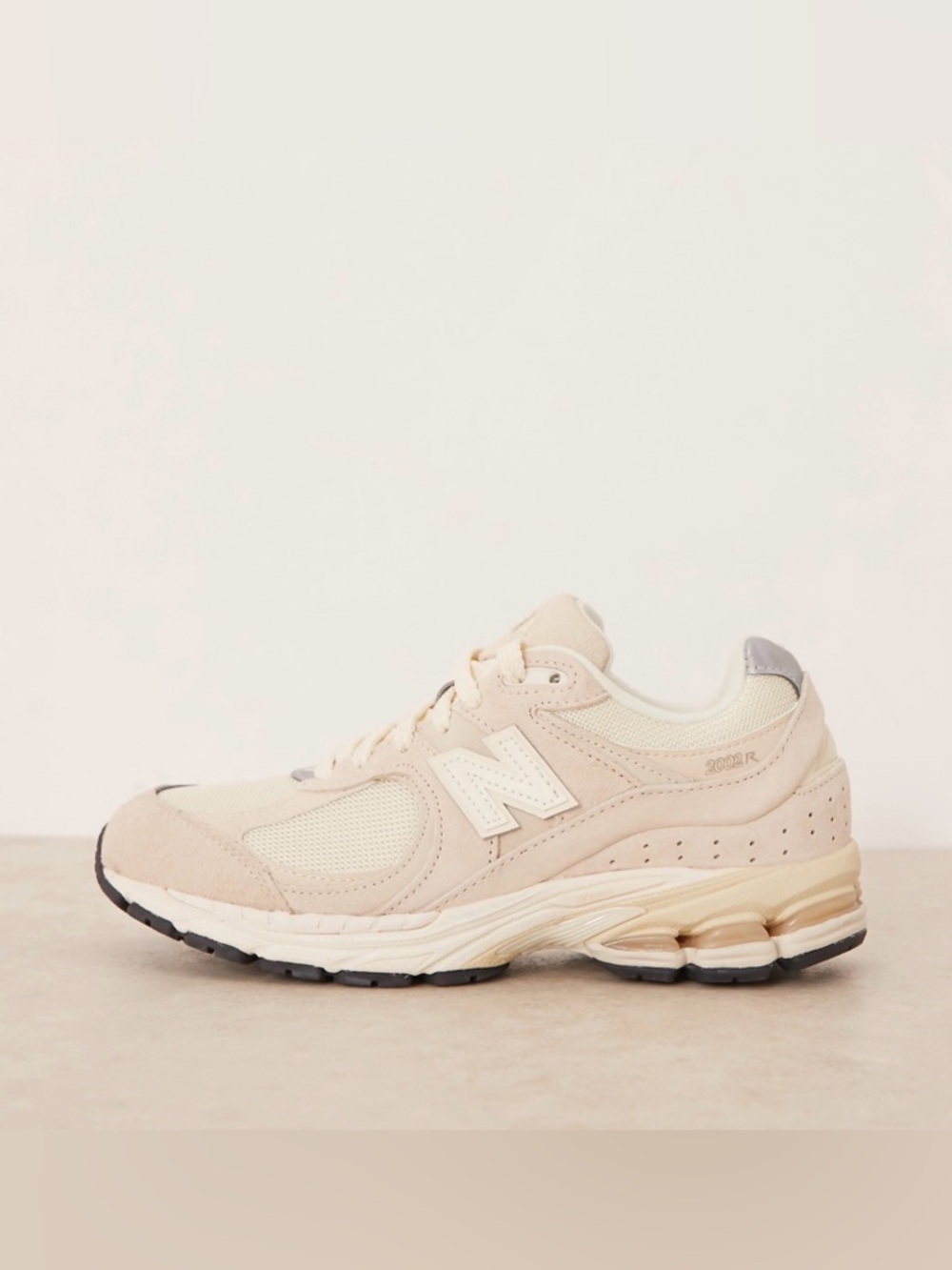 New Balance Women's 2002R Sneakers in Blush Pink and Cream